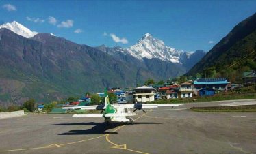 aero plane at lukla airport, lukla is gateway to everest base camp trekking by air
