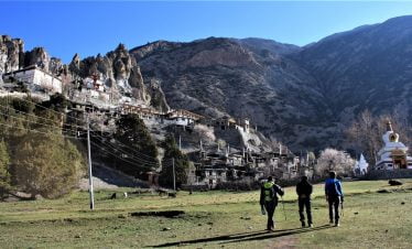 Trekkers walking towards Braka Monastery during Annapurna circuit tilicho lake trek