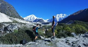 Friendship time to take picture of the mountains whereas the background is awesome in itself
