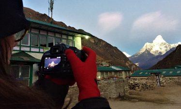Ada taking picture of Mt amadablam from Khumjung village