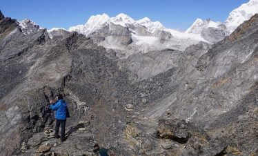 Rollo taking picture near the last pass, renjo la pass on his everest base camp 3high passes trekking adventure in everest