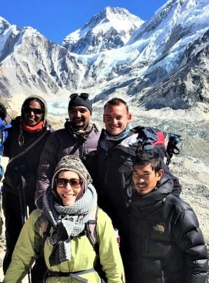 Everest 3 high pass trekking team posing right infront of Gorakshep village