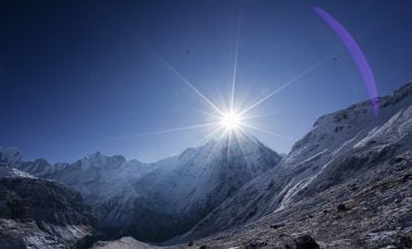 Sun rising above Mt Fishtail seen from the Annapurna base camp