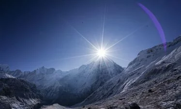 Sun rising above Mt Fishtail seen from the Annapurna base camp