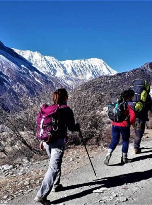 Our guests trekking towards Thorong la pass for an anaapurna circuit helicopter trek adventure