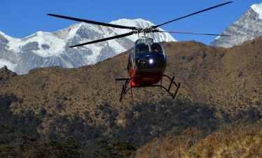 Annapurna Circuit Heli Trek - Our herlicopter taking people to Pokhara