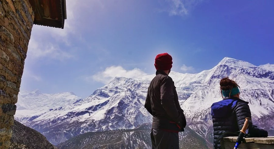 staring at the mountains from yak kharka while taking break on Round Annapurna trek