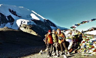 atop of thorong la pass during our annapurna round trek