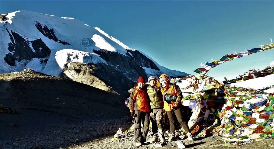 atop of thorong la pass during our annapurna round trek