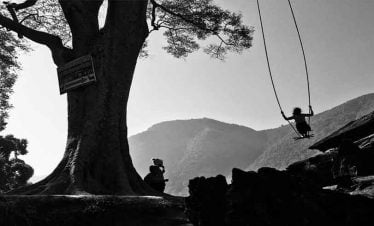 Swinging on the occasion of Tihar festival - captured on october tour of Bungmati Khokana day tour