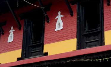 Cultural manuscripts on the walls of local house in our Bungmati Khokana 1 day tour