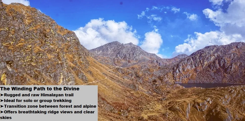 Gosaikunda Trek 3 Mountain trail through rocky, dry terrain under blue sky