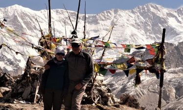 Old couple with young smile at the Kanchenjunga base camp