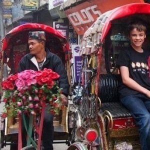 Kids enjoying rikshaw in their ricksaw ride tour