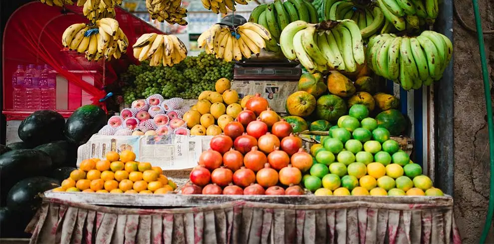 Local fruit shop at Kathmandu Asan seen during Evening tour of Kathmandu by Rikshaw