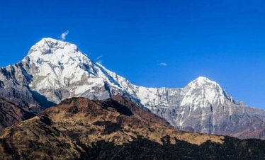 Closeness of the brown hill and the white Himalaya