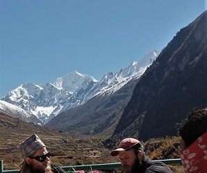 Boys enjoying the view and having their breakfast at Langtang valley section of langtang circuit trek
