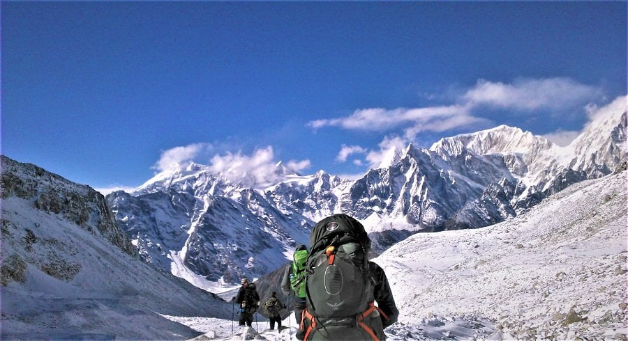 Trekkers at the top of Larkey pass in their Manaslu Tsum valley trekking trip in Nepal