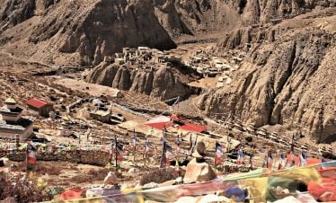 Local village and the monastery with prayer flags