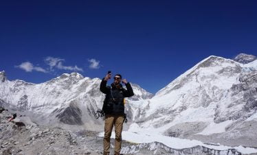 Happy client infront of Mount everest