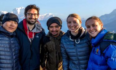 Taking a group picture at poonhill, poonhill is a gateway to short Annapurna base camp trek