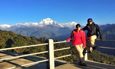 A couple pose at Ghorepani village on their way to short Annapurna basecamp trek