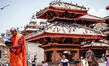 Monk with singing bowl seen in our best nepal tour