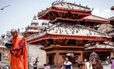 Monk with singing bowl seen in our best nepal tour