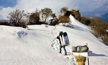 Porters taking all the logistics fro chulu peak climbing in annapurna