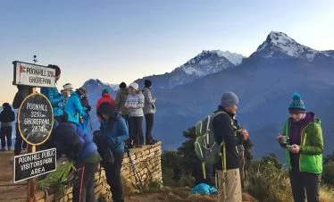 Picture of poonhill where people are waiting for the sunrise in their Ghorepani Ghandruk trek