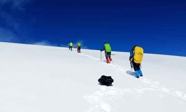 The first move on the thick snow for island peak climbing
