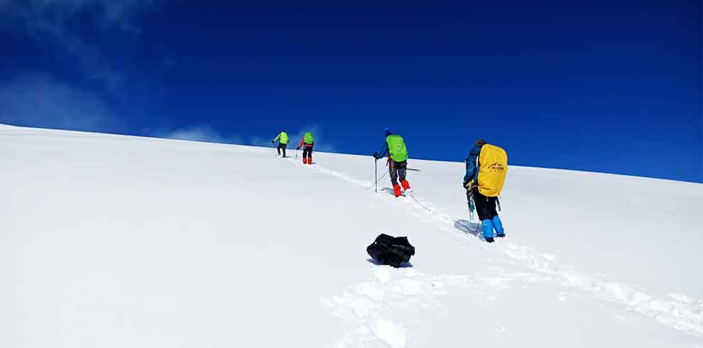 The first move on the thick snow for island peak climbing