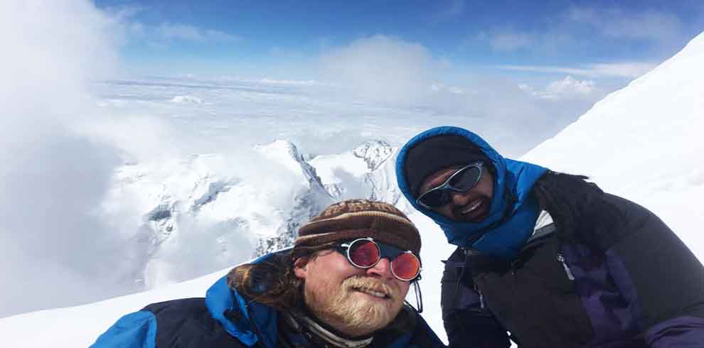 Arun and mark smiling at the summit of island peak