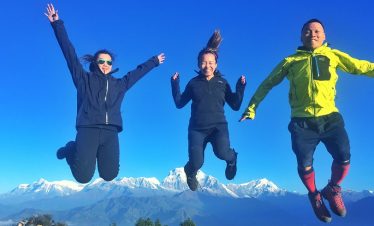 Happy trekkers jumping at the poonhill view point after getting back from Jomsom Muktinath trekking