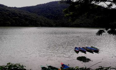 lake at pokhara with boats - waiting for the passenger to take on a tour