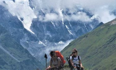 Girls taking break on their adventure trip in Nepal to Langtang Ganja la pass trek