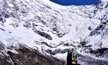 Langtang Lirung glacier and hat of our solo female client