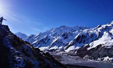 Posing at the Zenith of Langtang valley trek scenery