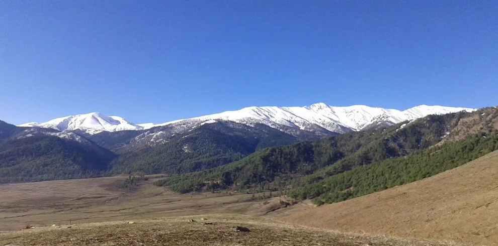 Whispers of the wind, echoes of the mountains