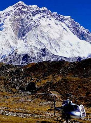 Helicopter refilling the gas infront of Mt Nuptse in our Everest nepal luxury tour