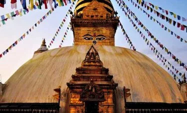 The eyes of Buddha at Swyambhunath stupa on a luxury tour in Nepal