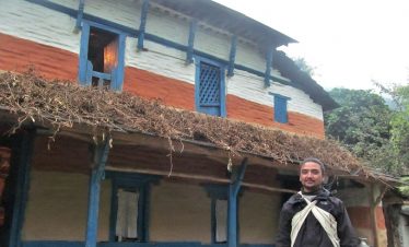 Guide with cultural dress in panchase trekking trip in Nepal