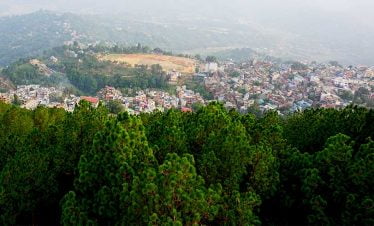 Looking out of the forest while hiking to Nagarjung monastery - inside shivapuri national park