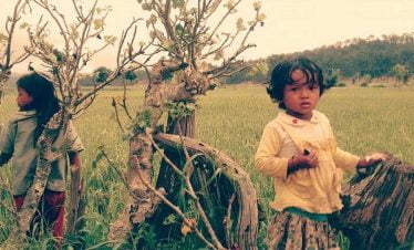 Beautiful shy village girl on her farm