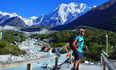 beauty of Manaslu Bhimtang trek revealed in the picture taken on a wooden bridge