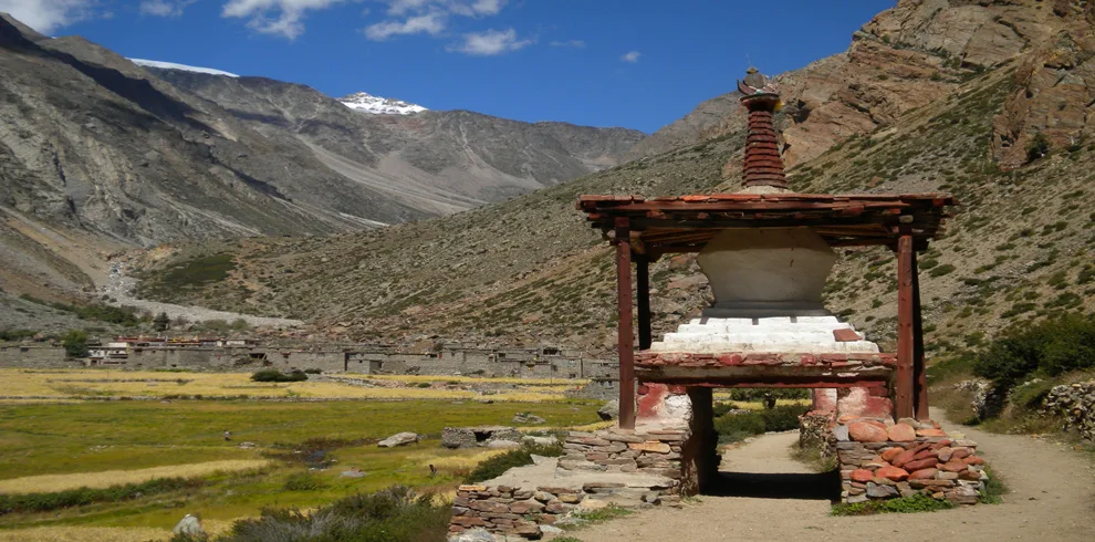 The path to Yalbang reveals a mix of lush greenery, rugged terrain, and mountain views