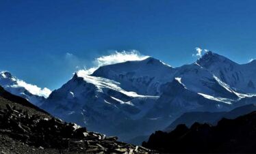 Looking at the annapurna range while trekking towards pisang peak climbing