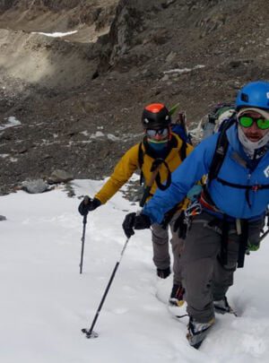 climbers on the trail to cholatse