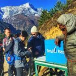 Donation time on our everest trek