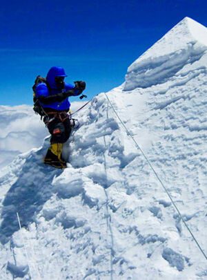 climber climbing towards makalu